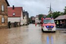 Die Ortsmitte des Lülsfelder Gemeindeteils Schallfeld stand am 9. Juli 2021 ruckzuck unter Wasser.
